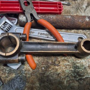 Antique row boat motor connecting rod